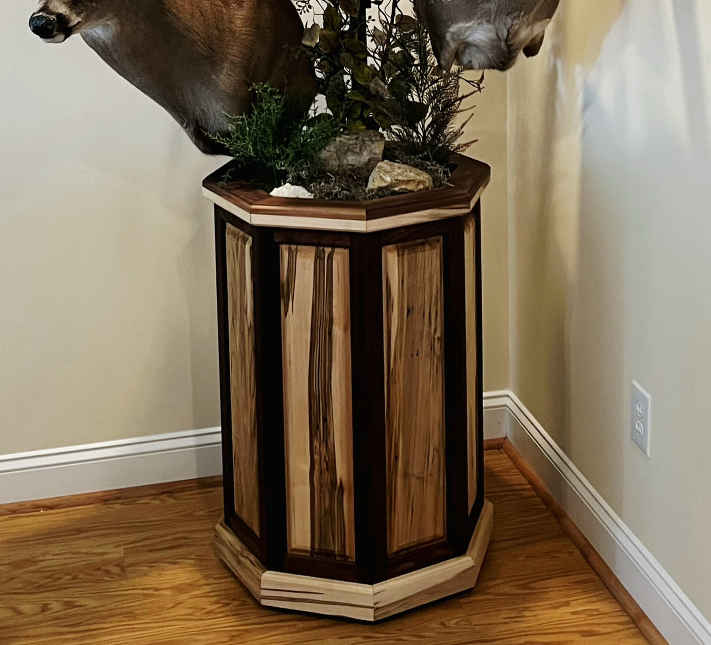Octagon hardwood taxidermy pedestal showing raised-panel construction